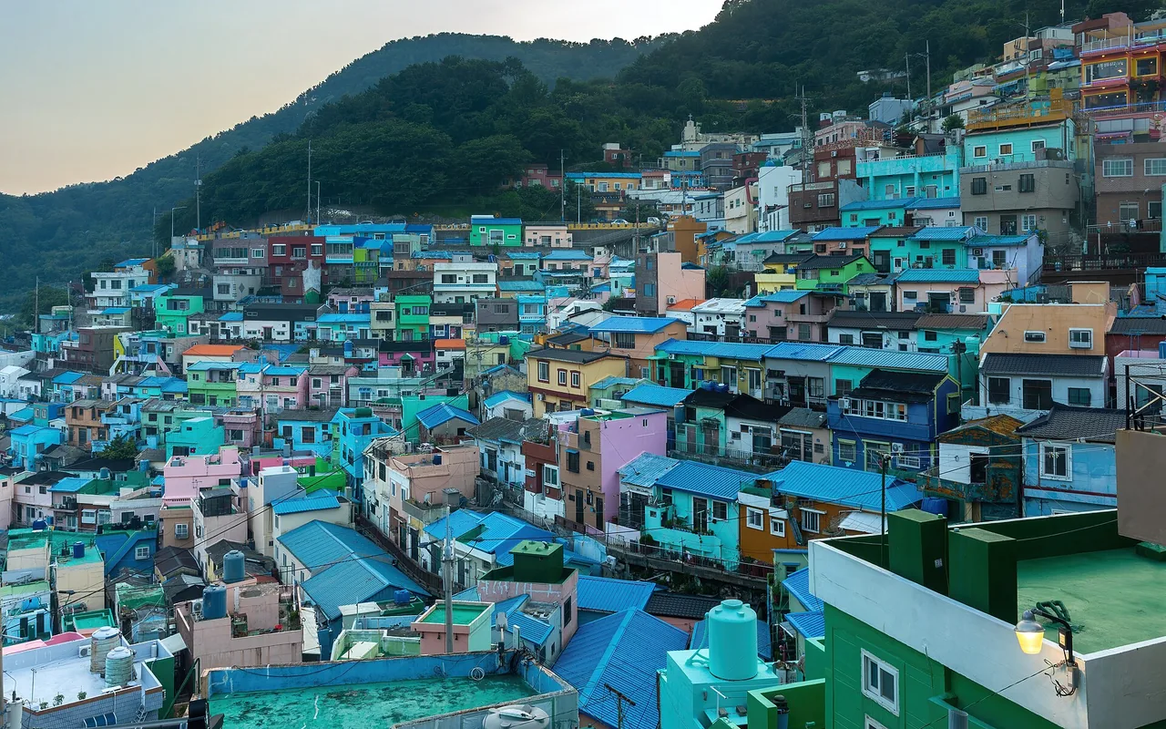 Colorful hillside houses of Gamcheon Culture Village at sunset, Busan