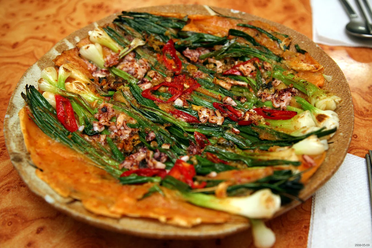 Seafood and spring onion pancake in the style of Busan's Dongnae pajeon