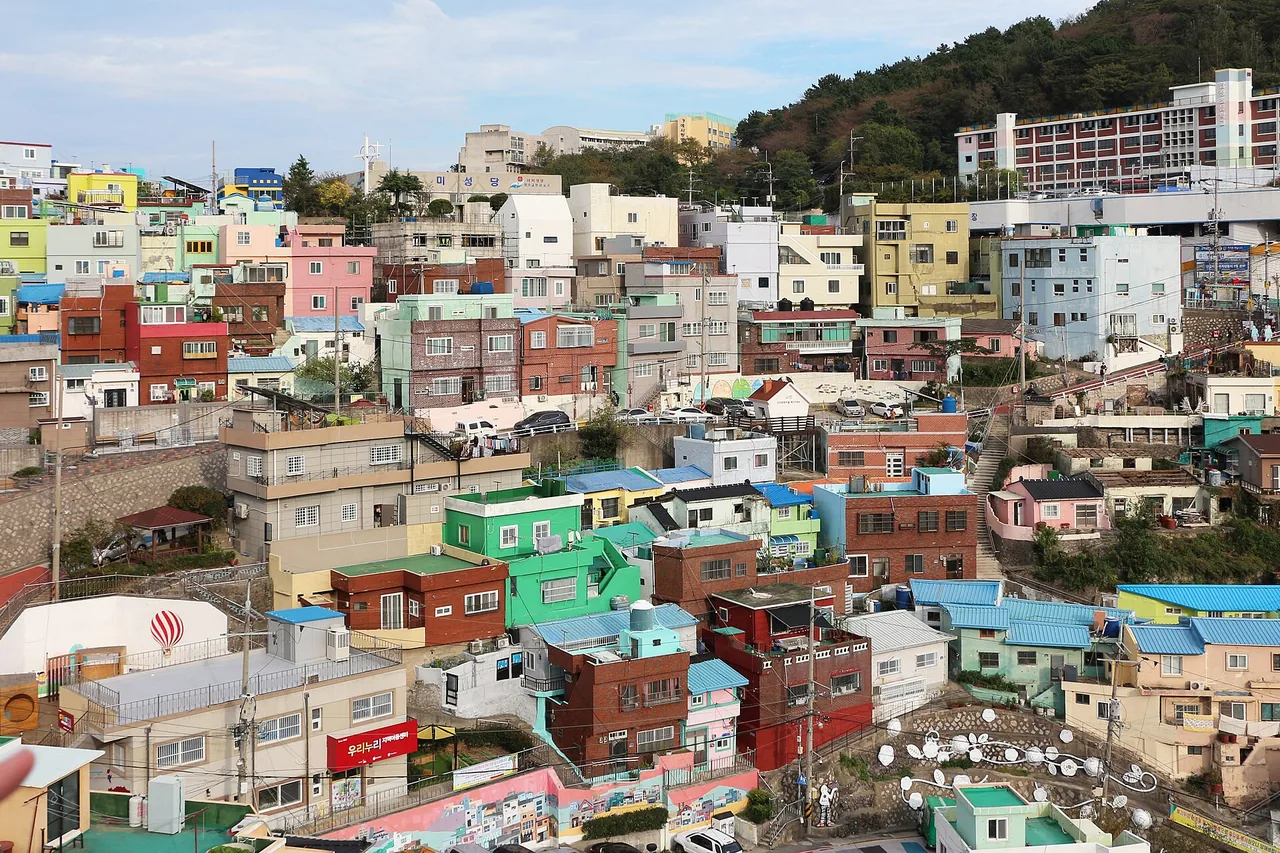 Pastel houses stacked up the hillside at Gamcheon Culture Village, Busan