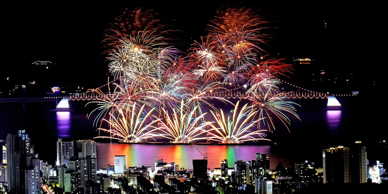 Busan Fireworks Festival bursting in colour over the Gwangan Bridge at night Busan Fireworks Festival bursting in colour over the Gwangan Bridge at night