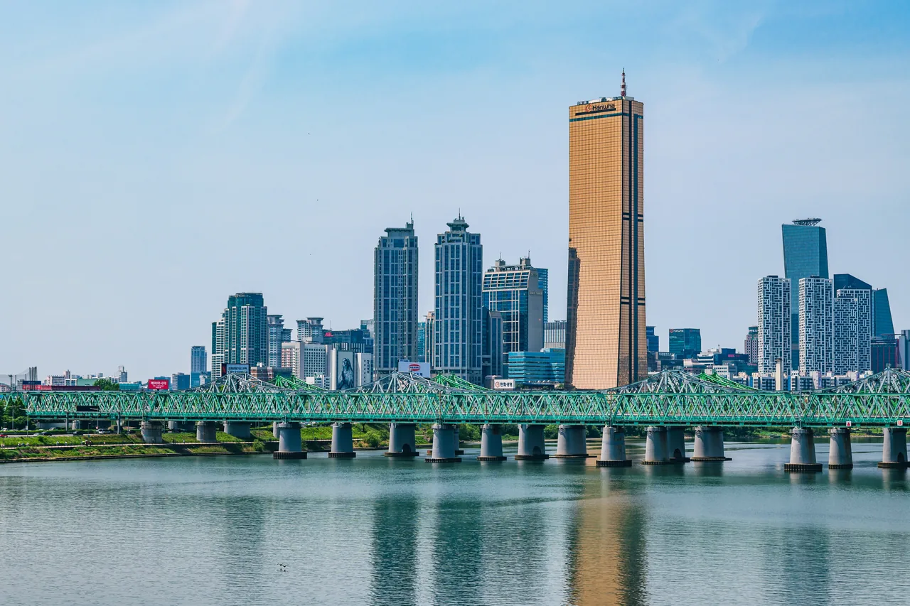 Yeouido's skyscrapers and the Hangang Railway Bridge along the Han River in Seoul