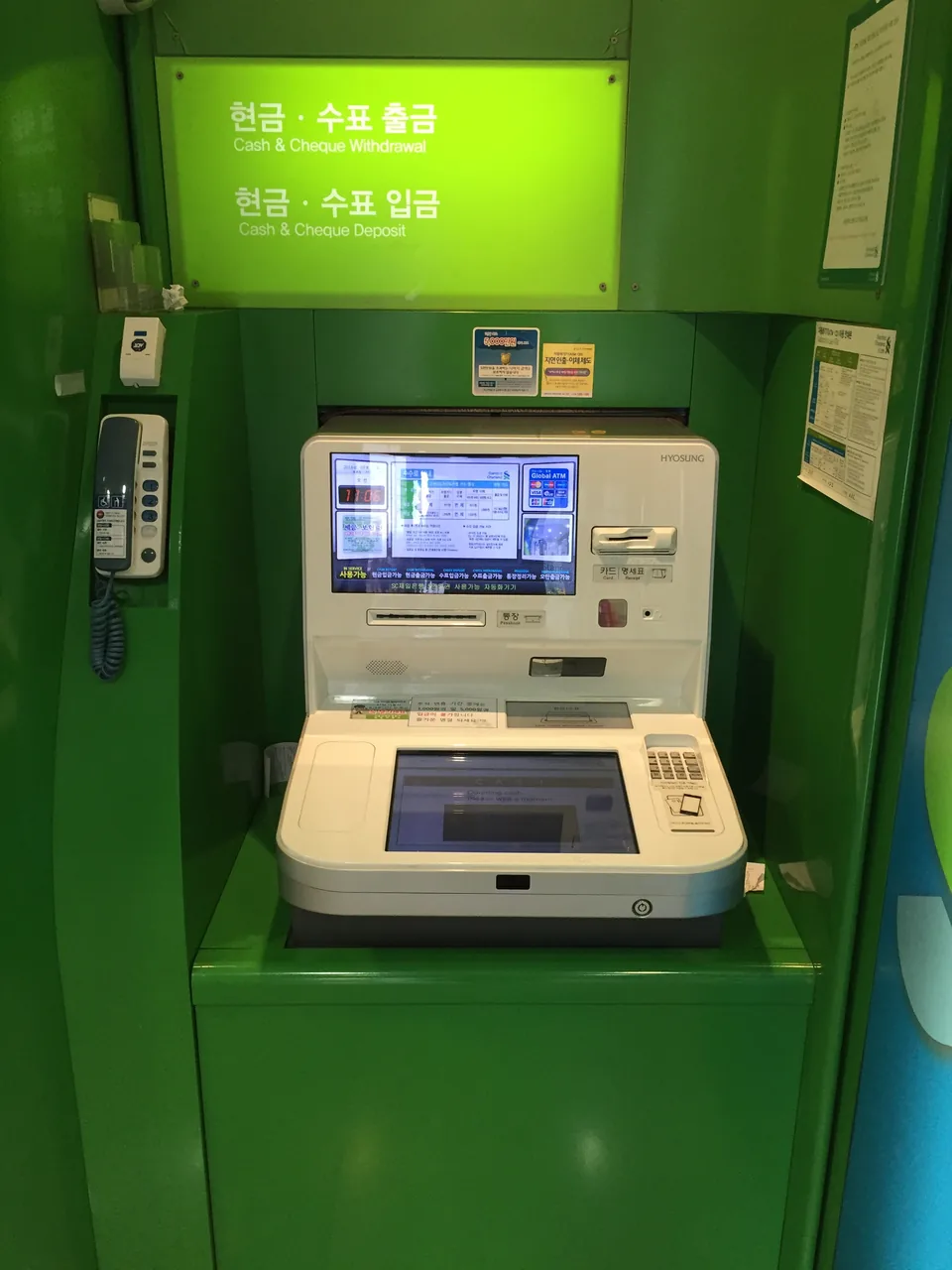 A cash-withdrawal ATM in South Korea with English labels A cash-withdrawal ATM in South Korea with English labels