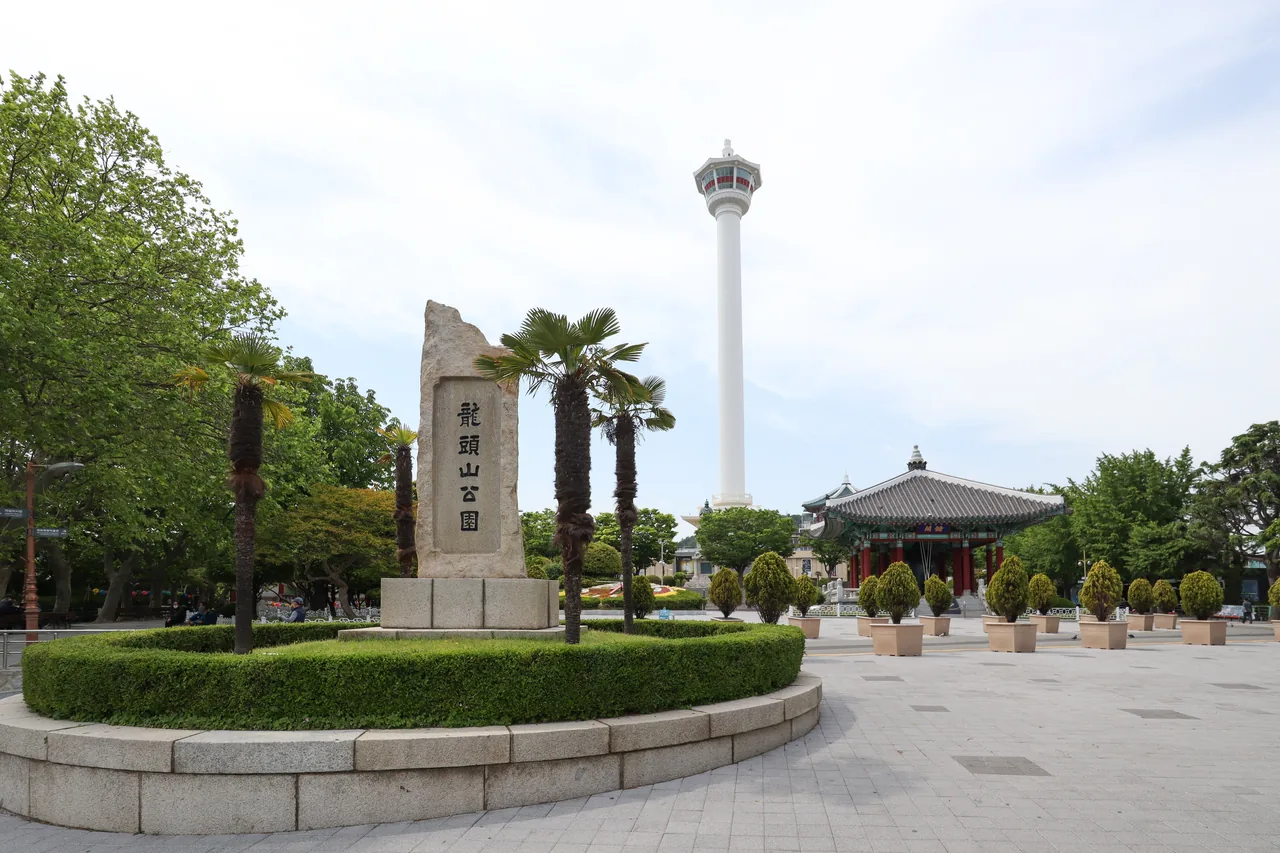 Busan Tower rising over Yongdusan Park above the old downtown of Nampo, Busan