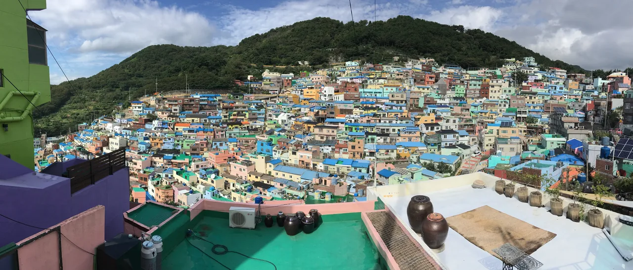The colorful pastel houses of Gamcheon Culture Village stacked on a hillside in Busan