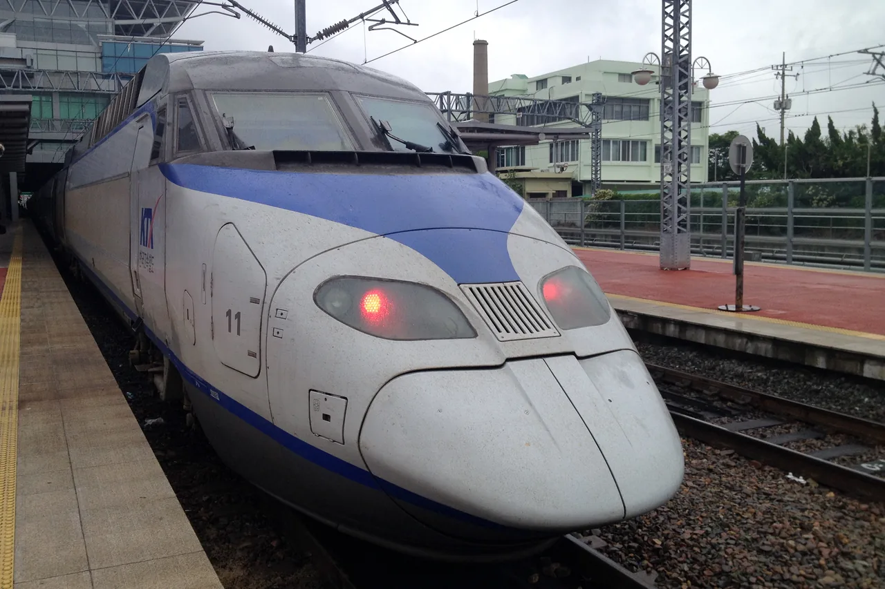 A KTX high-speed train at the platform of Busan Station