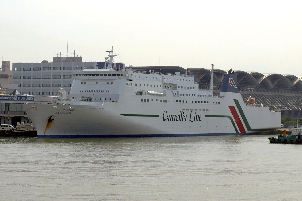 The New Camellia ferry alongside at port, Camellia Line livery on the hull
