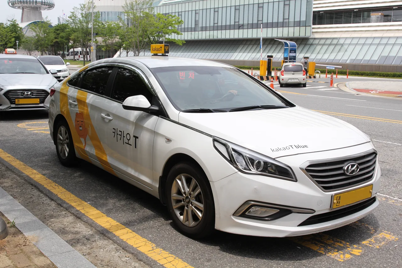 A Kakao T taxi, Korea's dominant ride-hailing app A Kakao T taxi, Korea's dominant ride-hailing app
