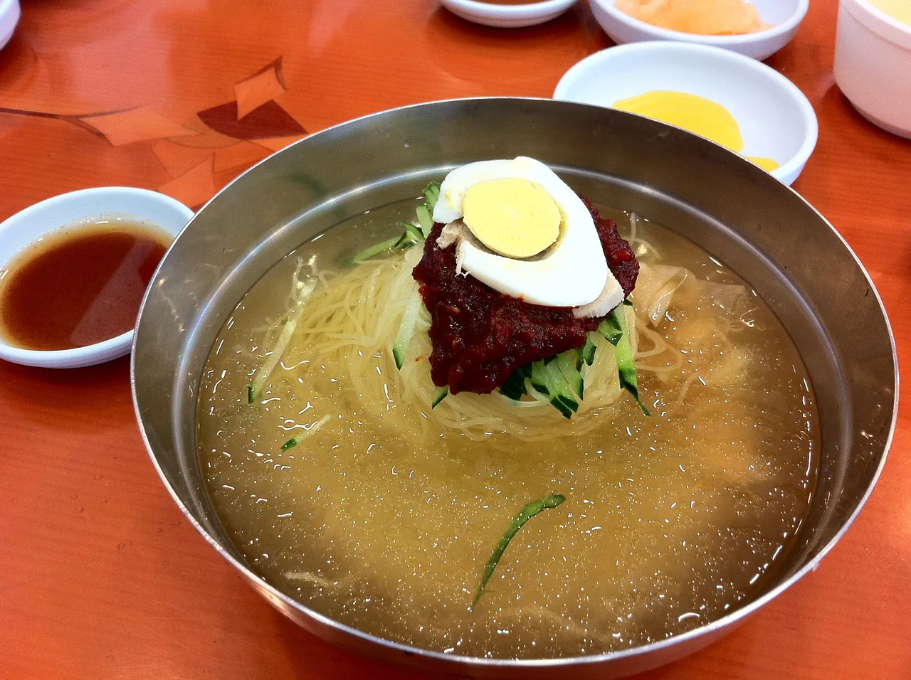 A bowl of milmyeon in the clear, clean-broth style associated with Gaegeum Milmyeon A bowl of milmyeon in the clear, clean-broth style associated with Gaegeum Milmyeon
