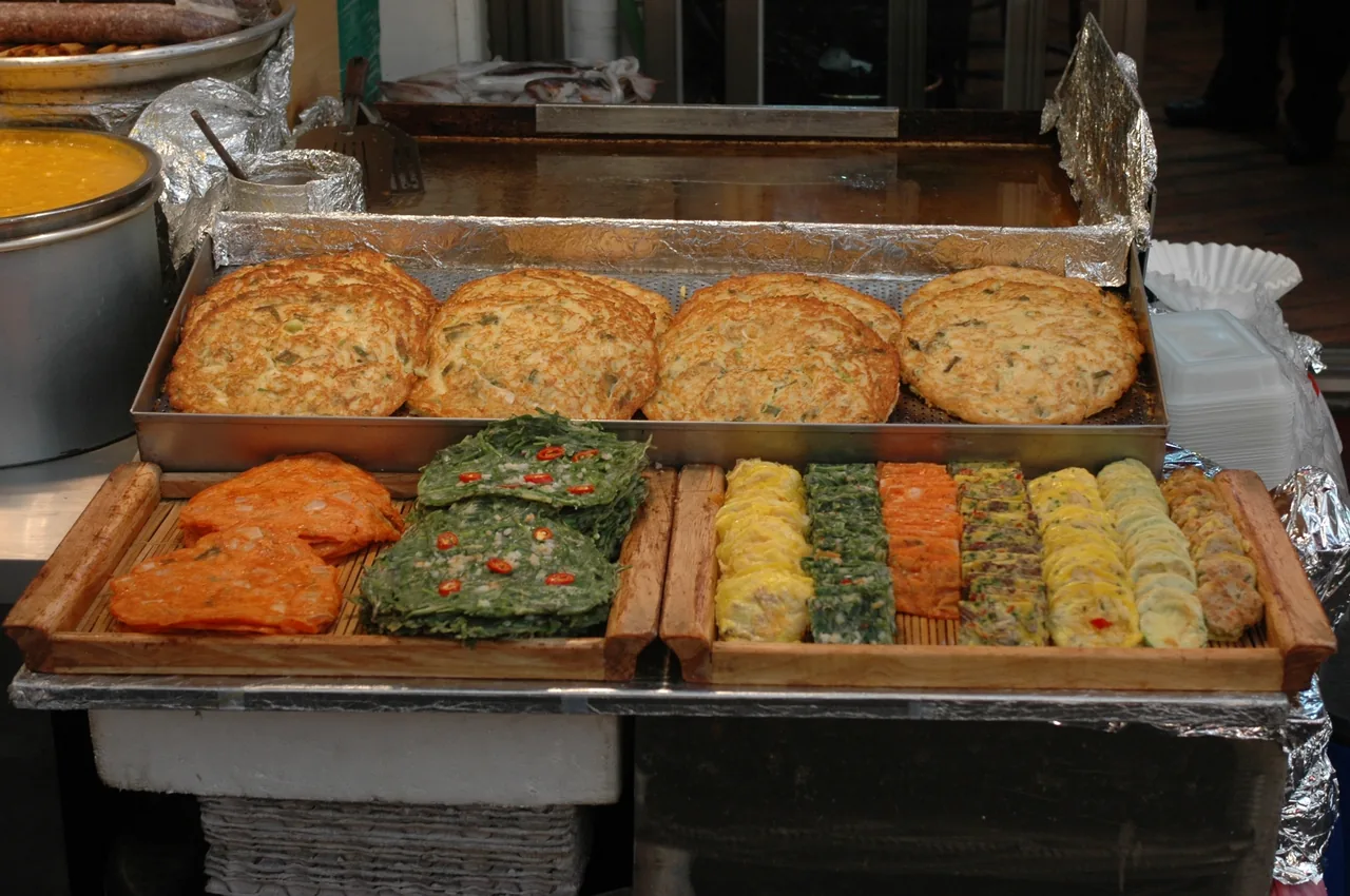 Jeon and pan-fried street food stalls at Gwangjang Market, Seoul