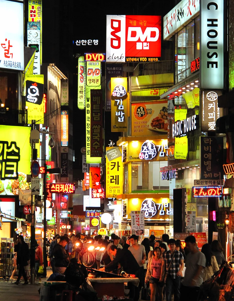 Neon signs and covered shopping arcades in Myeongdong, Seoul