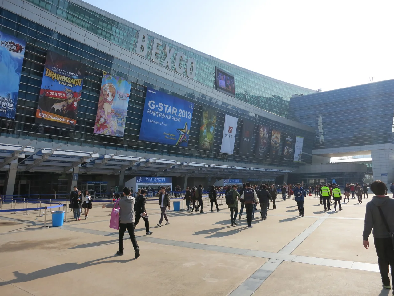 The entrance plaza at BEXCO with a G-STAR banner on the building