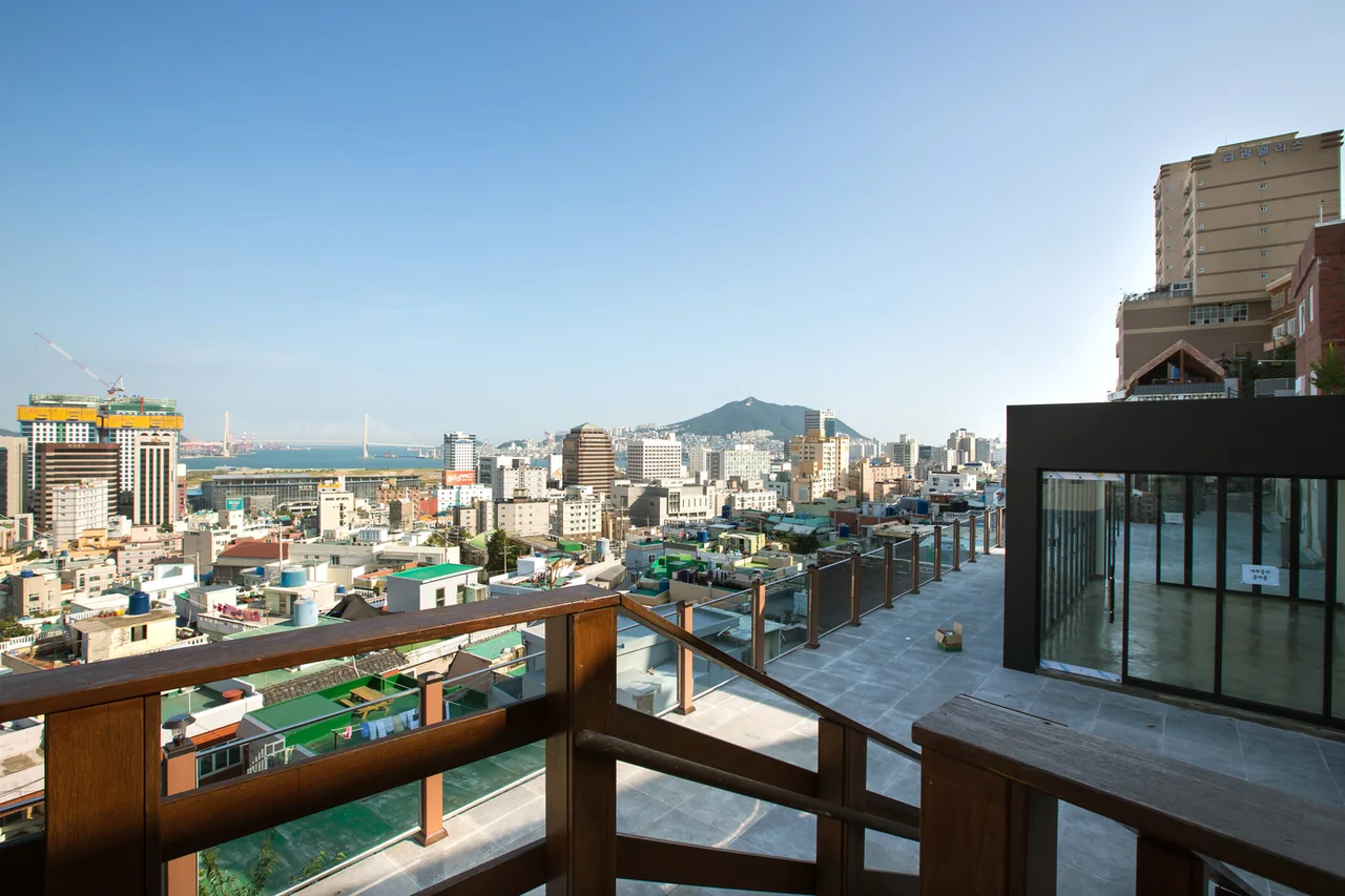 View from the observatory deck over the rooftops of old Choryang towards North Port and the harbour bridge