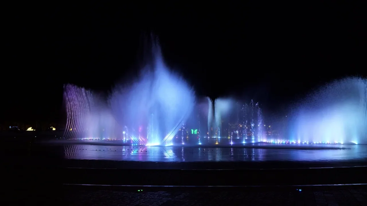 The Dadaepo music fountain lit at night