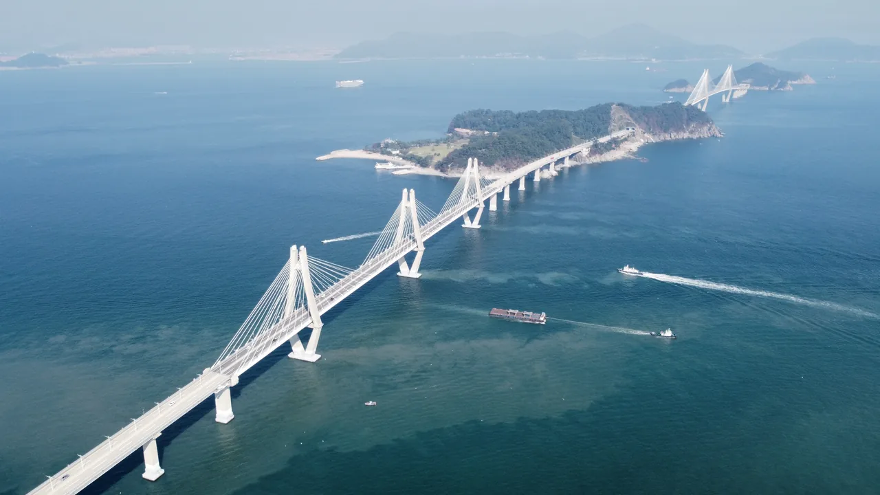 The Busan to Geoje bridge spanning open water between the mainland and the island