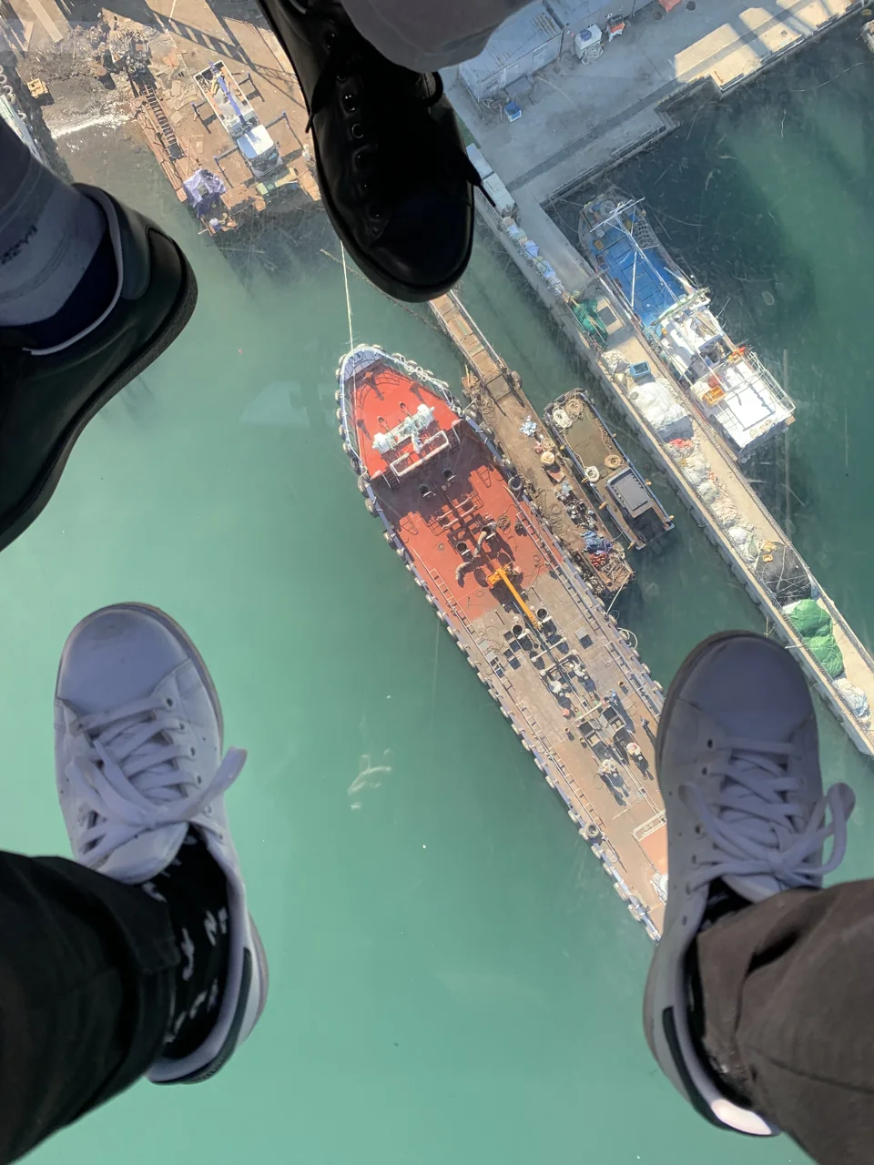 The glass floor of a crystal cabin on the Yeosu sea cable car