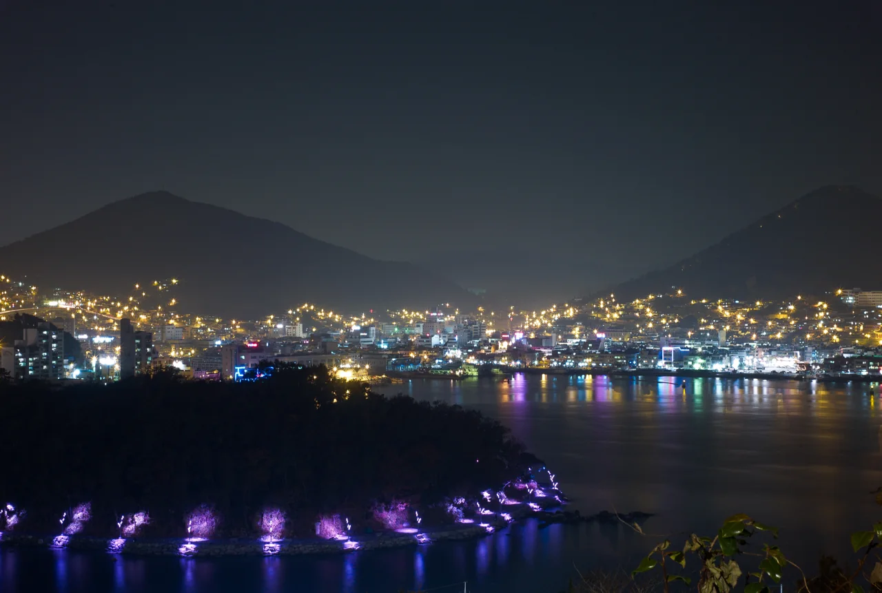 The Yeosu waterfront at night with the harbour lit up