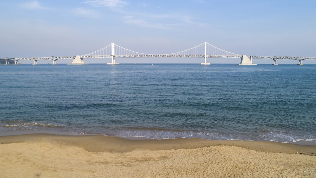 The Gwangan Bridge seen head-on from the sand at Gwangalli