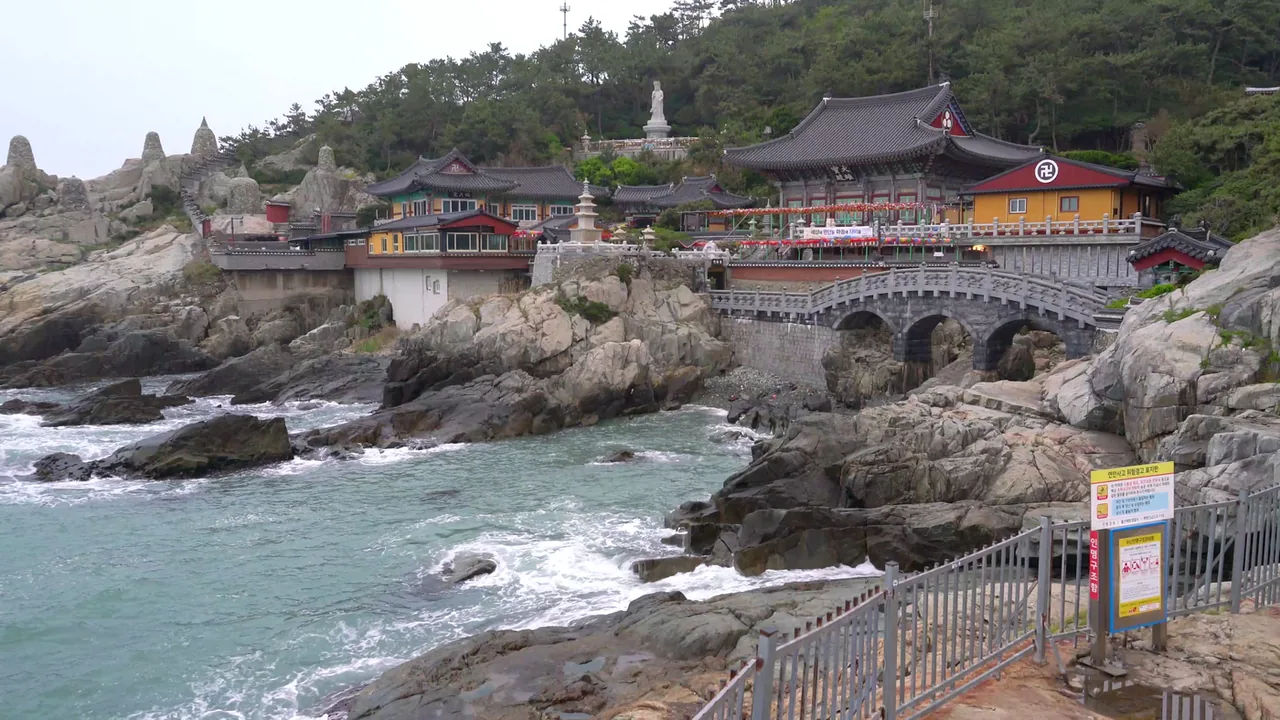 The halls and stone bridge of Haedong Yonggungsa on the sea rocks