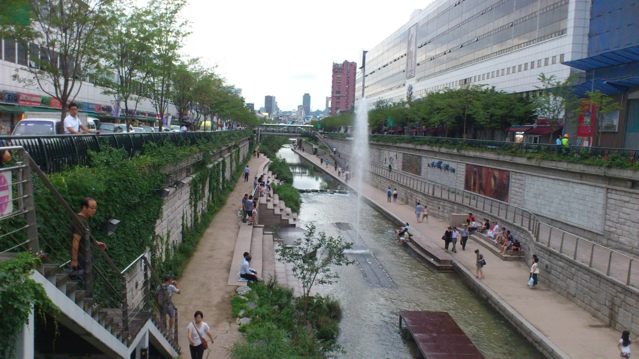 The Cheonggyecheon stream flowing past Dongdaemun market buildings